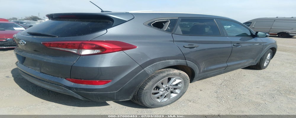 KM8J33A40GU128266 2016 HYUNDAI TUCSON photo no. 4
