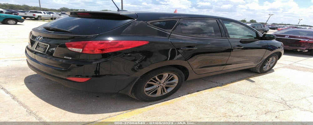 KM8JTCAF9EU824512 2014 HYUNDAI TUCSON photo no. 4