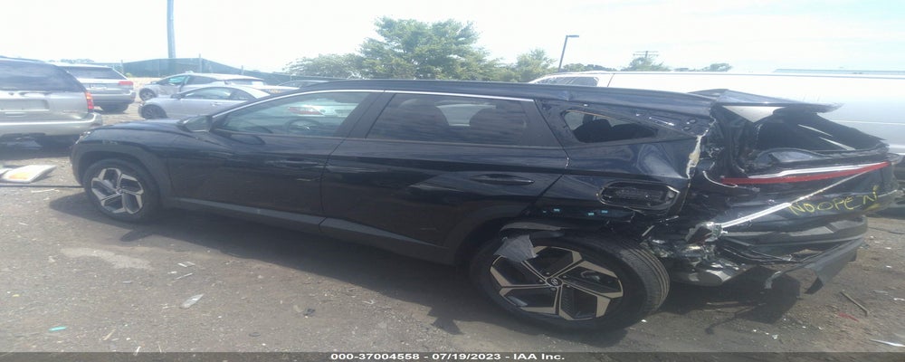 KM8JFCA17NU049607 2022 HYUNDAI TUCSON HYBRID photo no. 3