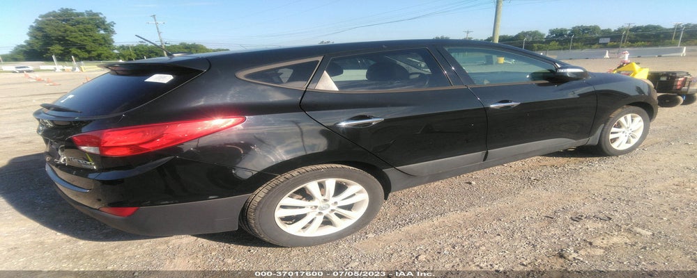 KM8JU3AC1DU724180 2013 HYUNDAI TUCSON photo no. 4