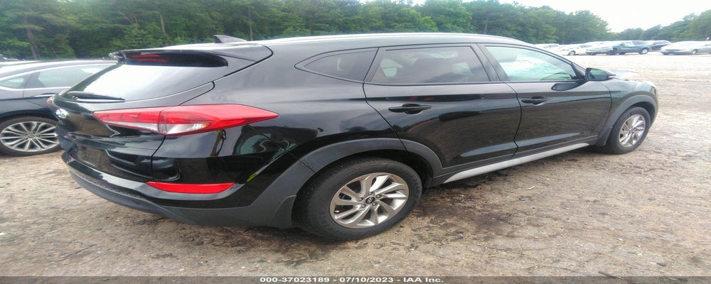 KM8J33A46HU502848 2017 HYUNDAI TUCSON photo no. 4
