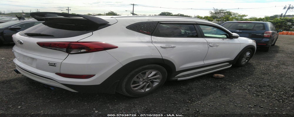 KM8J3CA27HU295627 2017 HYUNDAI TUCSON photo no. 4