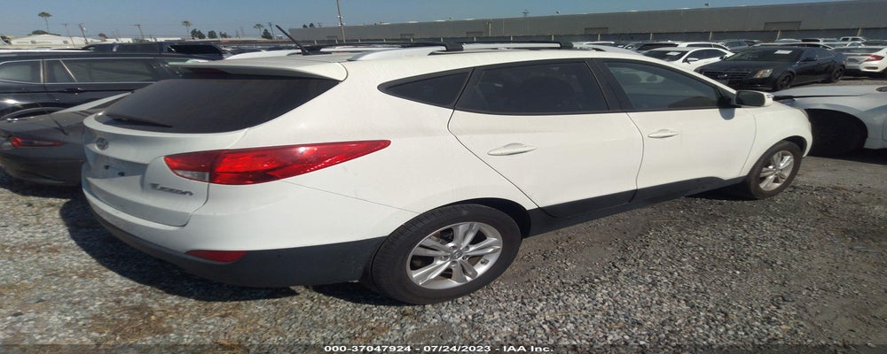 KM8JU3AC3CU471264 2012 HYUNDAI TUCSON photo no. 4