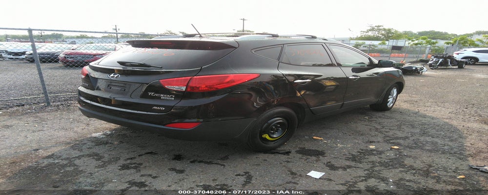 KM8JUCAC0BU233631 2011 HYUNDAI TUCSON photo no. 4