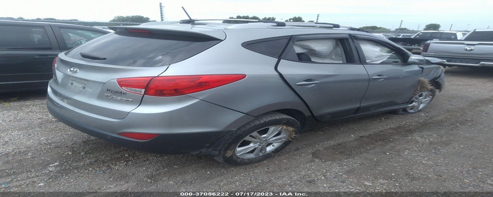 KM8JU3AC8DU729716 2013 HYUNDAI TUCSON photo no. 4