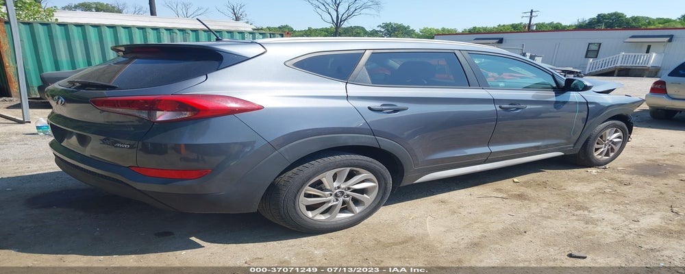 KM8J3CA49HU504643 2017 HYUNDAI TUCSON photo no. 4