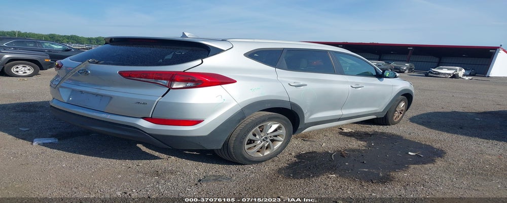 KM8J3CA41JU708407 2018 HYUNDAI TUCSON photo no. 4