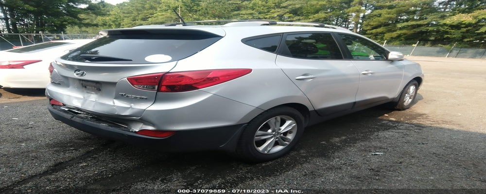 KM8JU3AC4DU657588 2013 HYUNDAI TUCSON photo no. 4