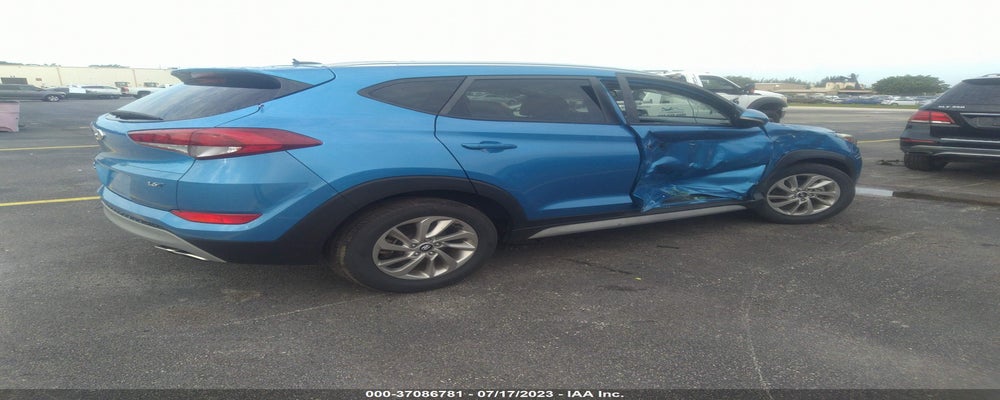 KM8J33A20HU525640 2017 HYUNDAI TUCSON photo no. 4