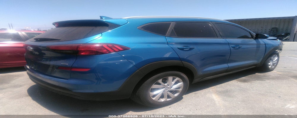 KM8J3CA44KU946625 2019 HYUNDAI TUCSON photo no. 4