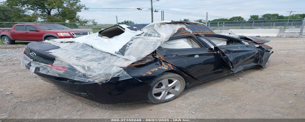 KMHDH4AE8CU321837 2012 HYUNDAI ELANTRA photo no. 4
