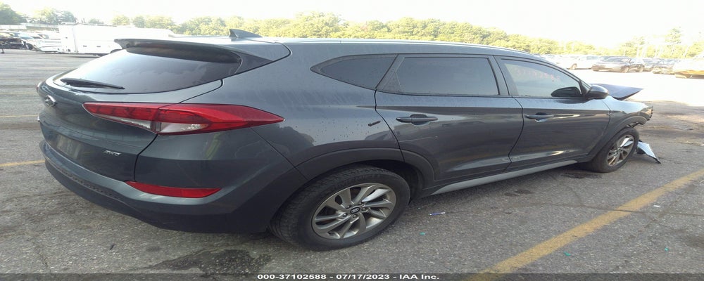 KM8J3CA40JU716482 2018 HYUNDAI TUCSON photo no. 4