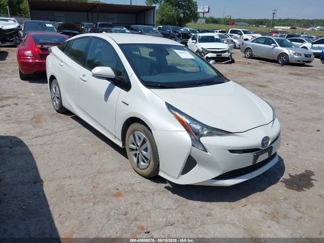 2018 TOYOTA PRIUS FOUR