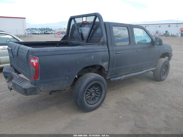 2002 Nissan FRONTIER XE-V6 — фото 4