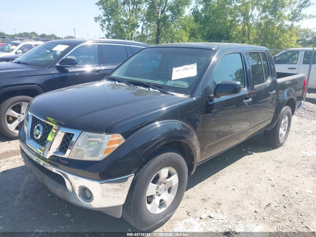 2009 Nissan FRONTIER SE — фото 2