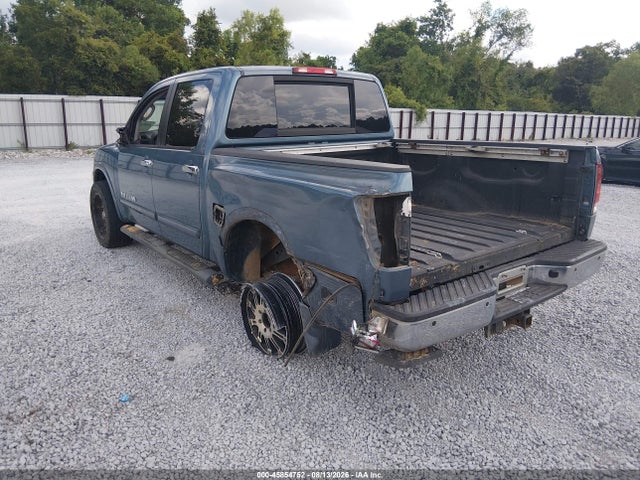2010 Nissan TITAN LE — миниатюра 3