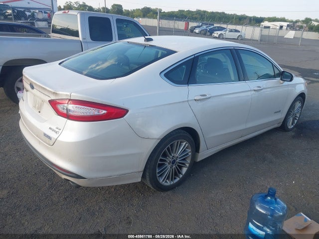 صورة 4 لـ 2013 FORD FUSION HYBRID SE