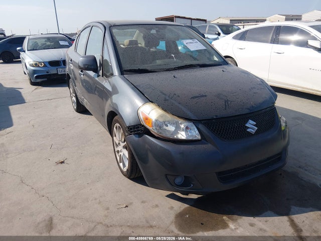 2011 SUZUKI SX4 LE/LE ANNIVERSARY EDITION