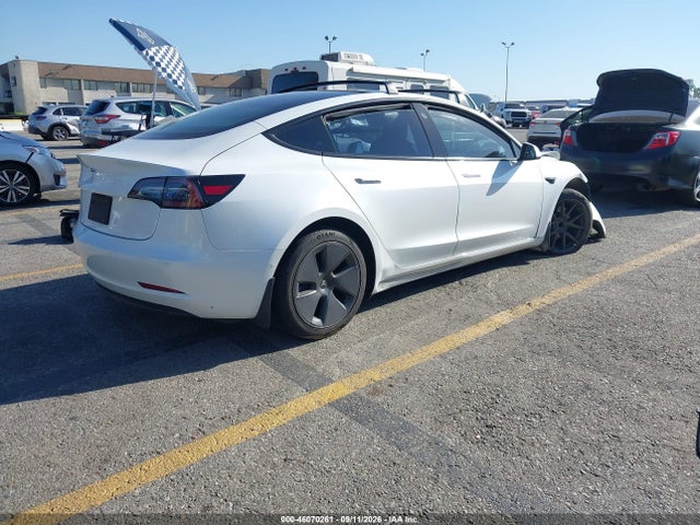 2021 TESLA MODEL 3 STANDARD RANGE PLUS REAR-WHEEL DRIVE 4