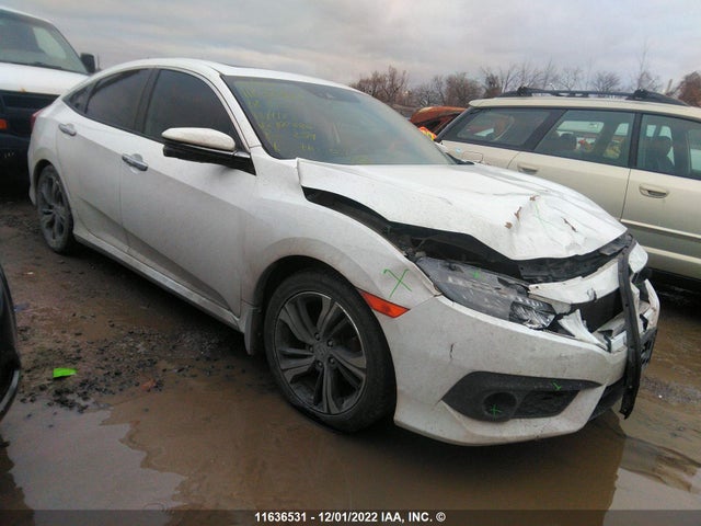 Honda Civic Touring 2018 2HGFC1F92JH100886 главное изображение