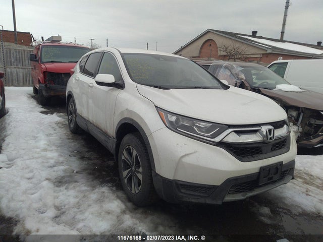 Honda CR-V LX 2018 2HKRW2H26JH129596 Image 1