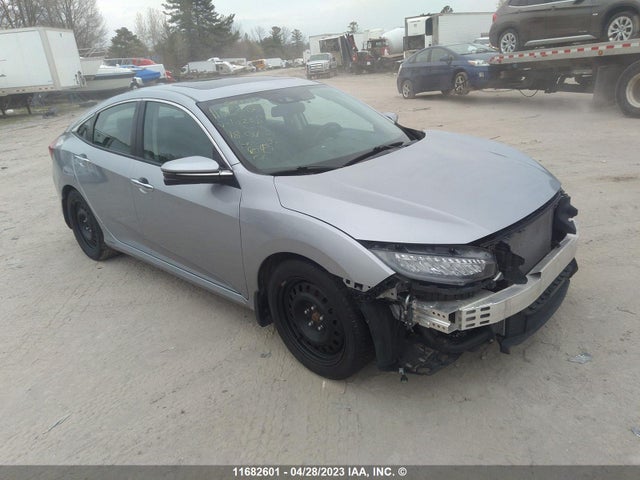 Honda Civic Touring 2018 2HGFC1F99JH102683 Image 1