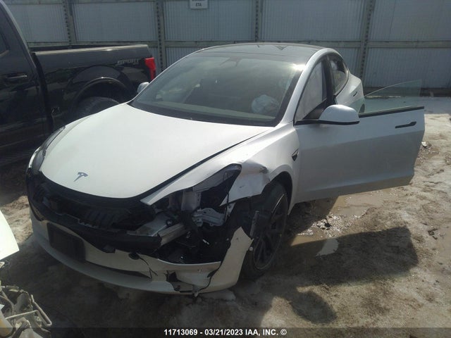 Tesla MODEL 3 2021 5YJ3E1EA2MF852492 Image 2