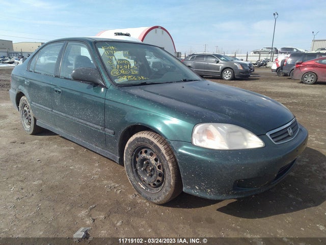 Honda CIVIC SE 1999 2HGEJ6610XH924547 Image 1