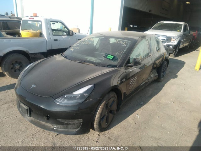 Tesla MODEL 3 2022 5YJ3E1EBXNF232385 Image 2