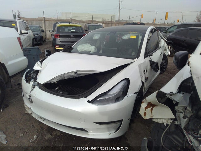 Tesla MODEL 3 2022 5YJ3E1ECXNF314772 Image 2