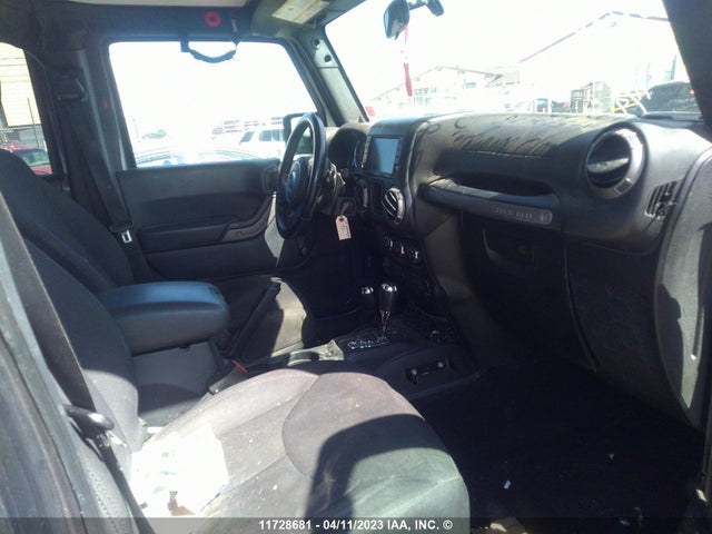1C4BJWDG9FL533486 Jeep Wrangler Unlimited Sport