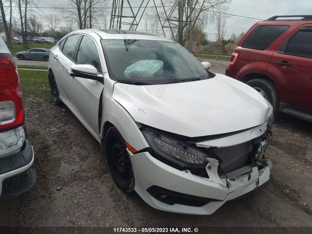 Honda Civic Sedan Touring 2017 2HGFC1F99HH100748 zdjęcie główne