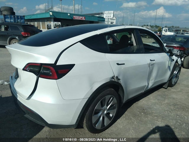 Tesla Model Y 2023 LRWYGDFD2PC966355 Image 4