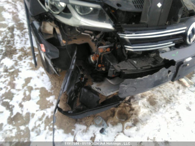 WVGKV7AX6GW033036 Volkswagen TIGUAN
