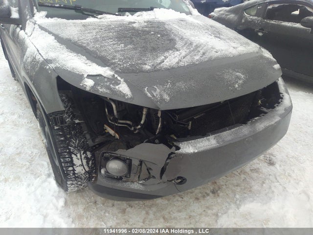WVGKV3AX5EW583060 Volkswagen TIGUAN S