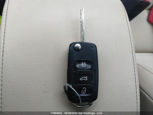 WVGJV3AX0EW515809 Volkswagen TIGUAN