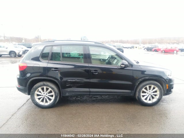 WVGJV3AX0EW515809 Volkswagen TIGUAN