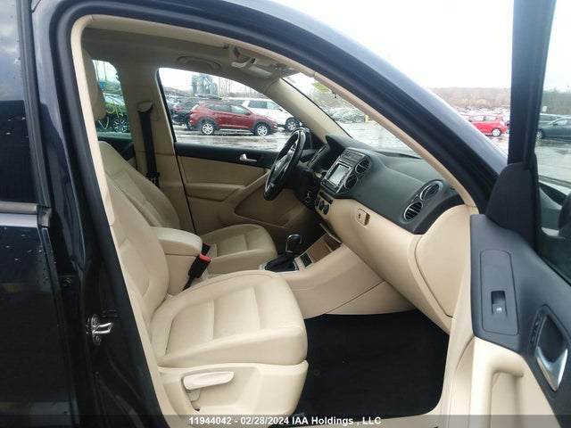 WVGJV3AX0EW515809 Volkswagen TIGUAN