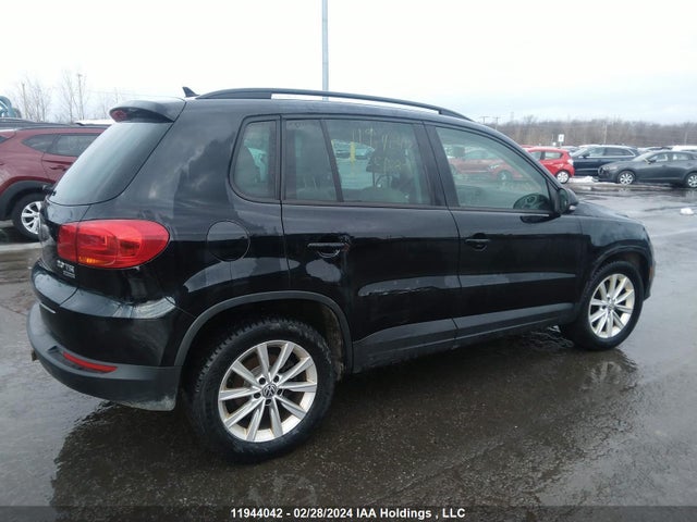 WVGJV3AX0EW515809 Volkswagen TIGUAN
