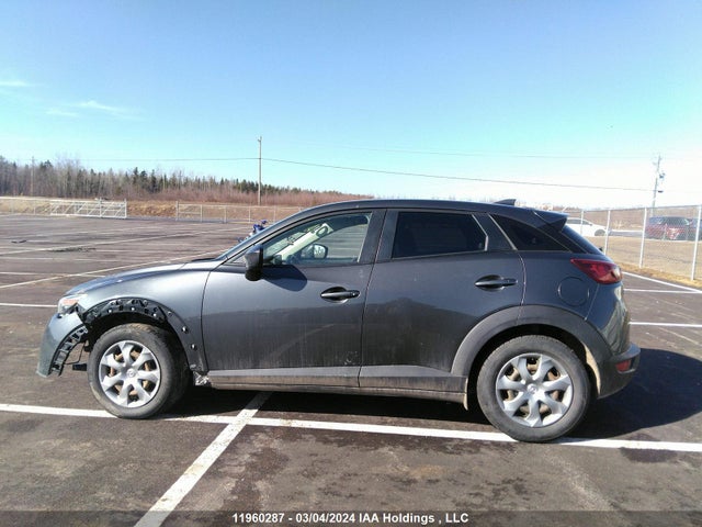 JM1DKDB73G0130944 Mazda CX-3