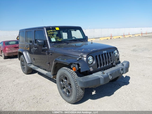 1C4BJWEG9EL244105 Jeep Wrangler Unlimited Sahara