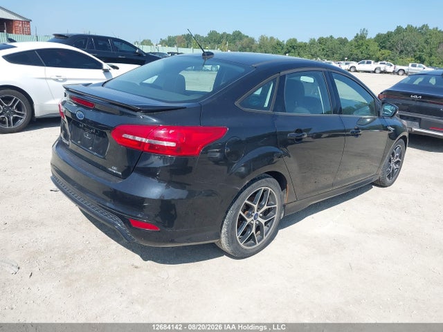 صورة 4 لـ 2015 FORD FOCUS SE