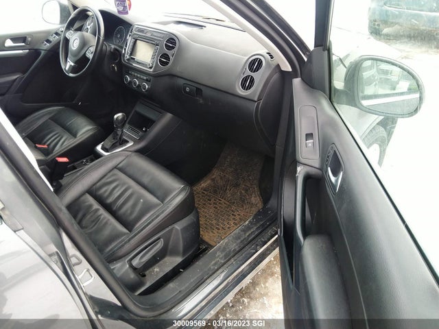 WVGJV3AX4EW550630 Volkswagen Tiguan S/se/sel/r-line