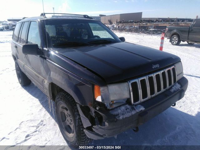 Auction sale of the 1998 Jeep Grand Cherokee Laredo/tsi, vin: 1J4GZ58YXWC218606, lot number: 30033497