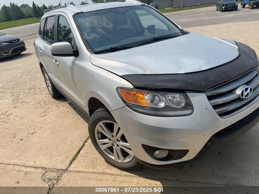 2012 Hyundai Santa Fe Se VIN: 5XYZHDAG8CG145031 Lot: 30067861