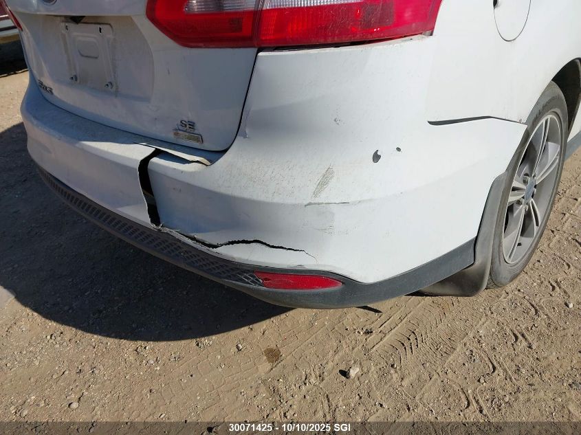 2018 Ford Focus Se VIN: 1FADP3FE4JL263485 Lot: 30071425