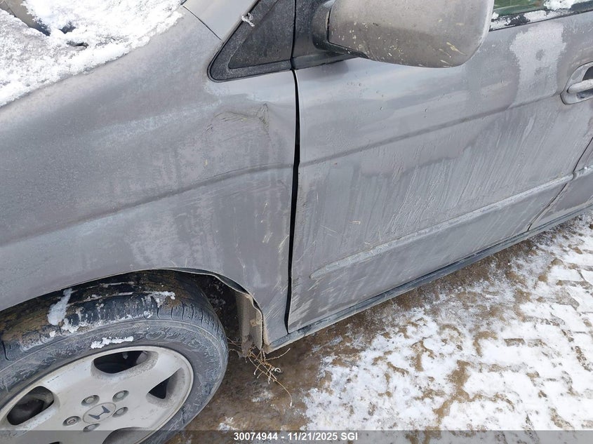 2001 Honda Odyssey Ex VIN: 2HKRL18661H010582 Lot: 30074944