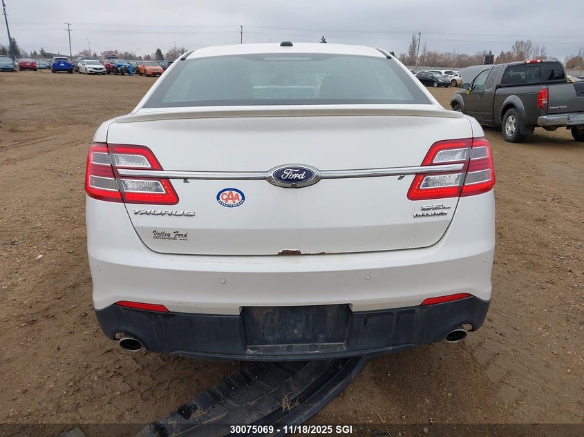 2015 Ford Taurus Sel VIN: 1FAHP2E84FG129728 Lot: 30075069