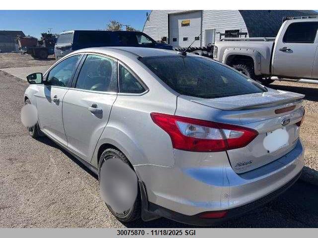 1FAHP3J23CL144523 2012 FORD FOCUS photo no. 3
