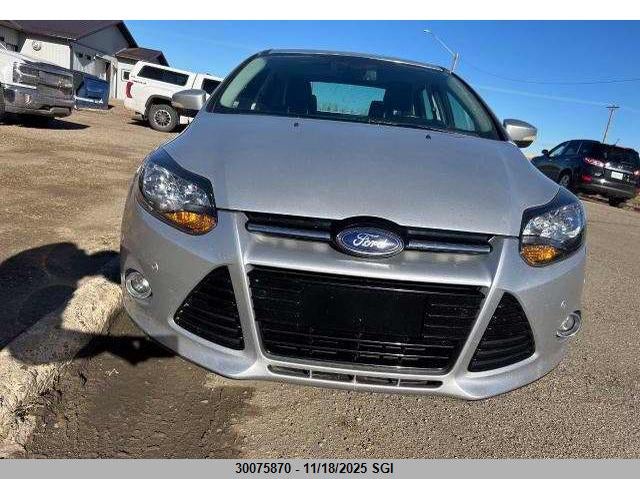 1FAHP3J23CL144523 2012 FORD FOCUS photo no. 6